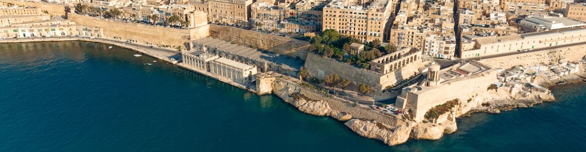Sunset over Valletta, MT coastline
